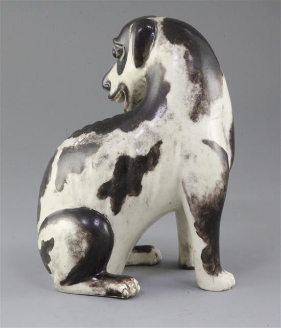 A Chinese export model of a seated hound, first half 18th century, height 19.5cm